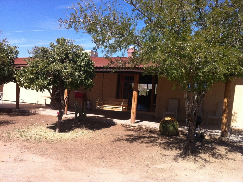 Cool porch to watch the mountains and wildlife - surrounded by citrus trees